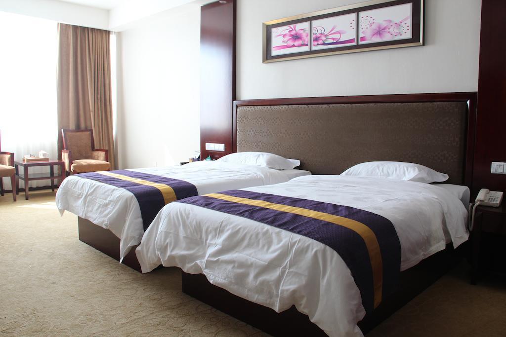 Zhuhai Platinum Holiday Hotel Oda fotoğraf