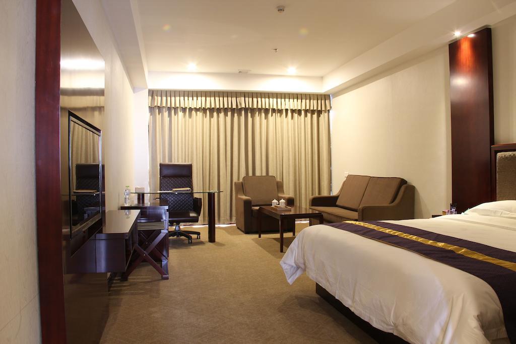 Zhuhai Platinum Holiday Hotel Oda fotoğraf