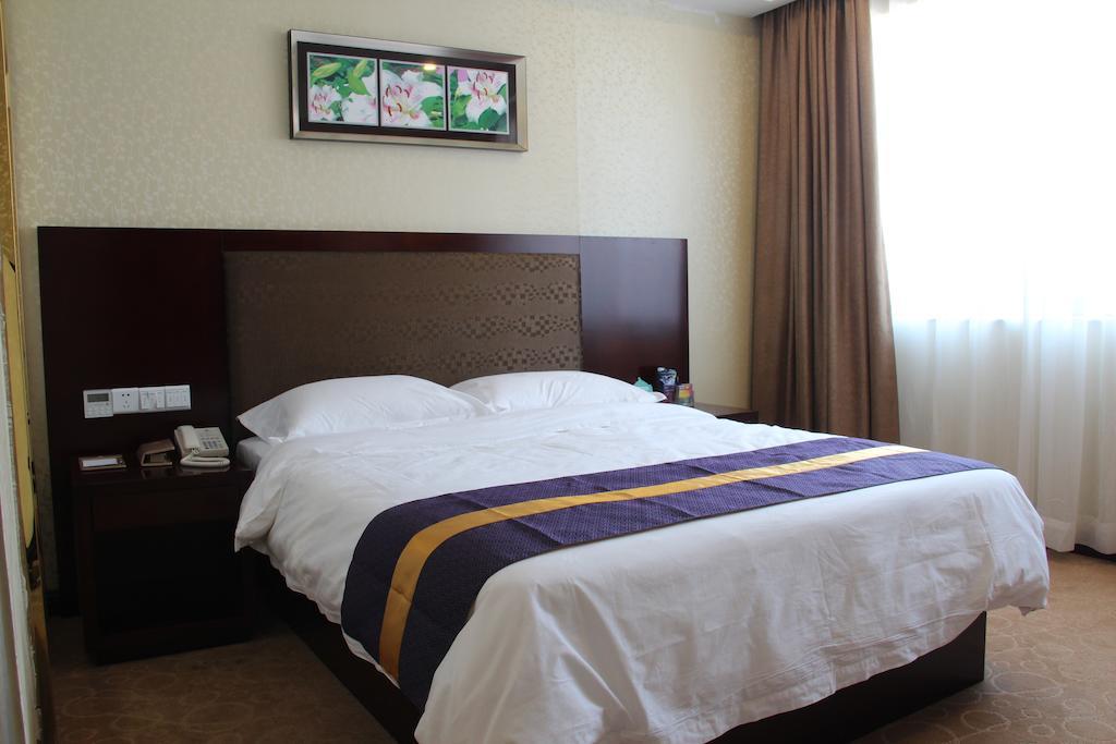 Zhuhai Platinum Holiday Hotel Oda fotoğraf